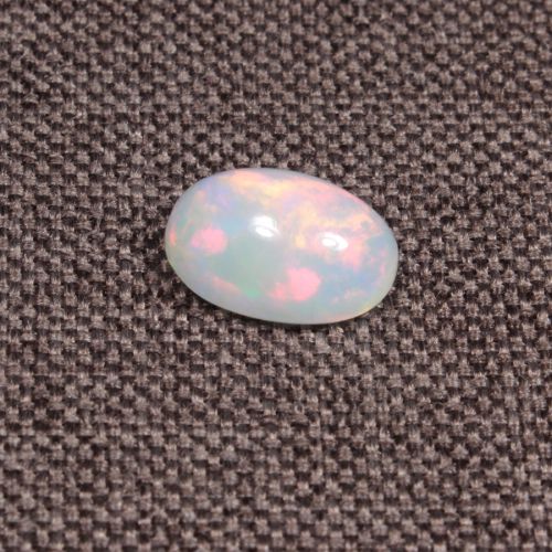 Opal z Etiopii kaboszon ok. 11x8 mm OPA1502