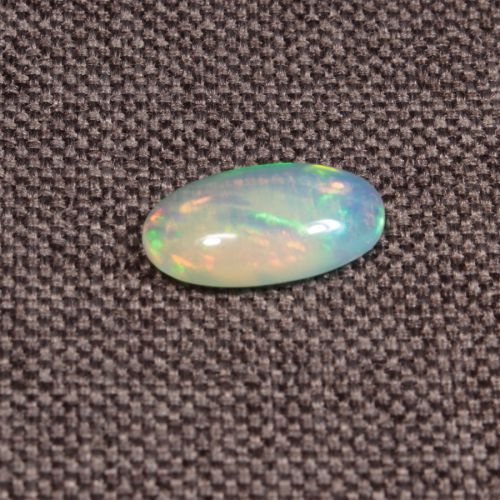 Opal z Etiopii kaboszon ok. 14x8 mm OPA1506