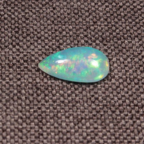 Opal z Etiopii kaboszon ok. 13x7 mm OPA1515