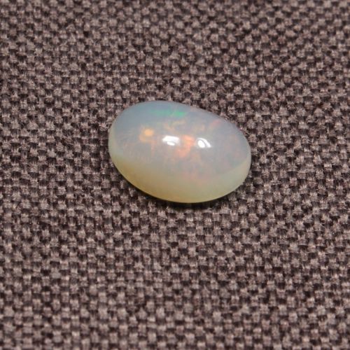 Opal z Etiopii kaboszon ok. 11x8 mm OPA1520