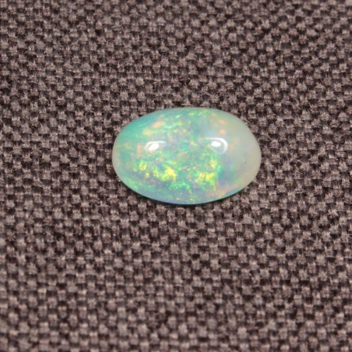 Opal z Etiopii kaboszon ok. 11x8 mm OPA1522