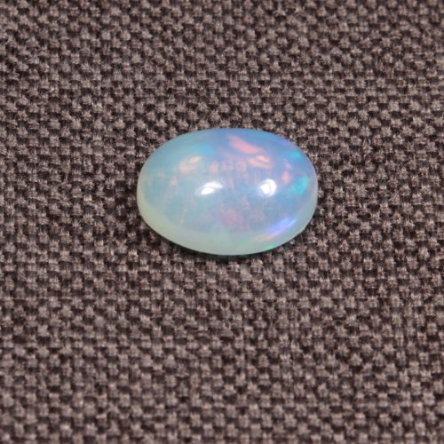 Opal z Etiopii kaboszon ok. 11x8 mm OPA1523