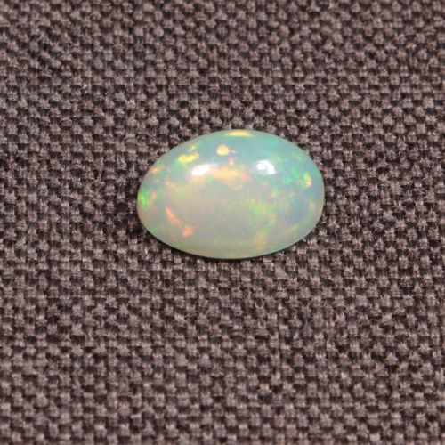 Opal z Etiopii kaboszon ok. 11x7 mm OPA1531