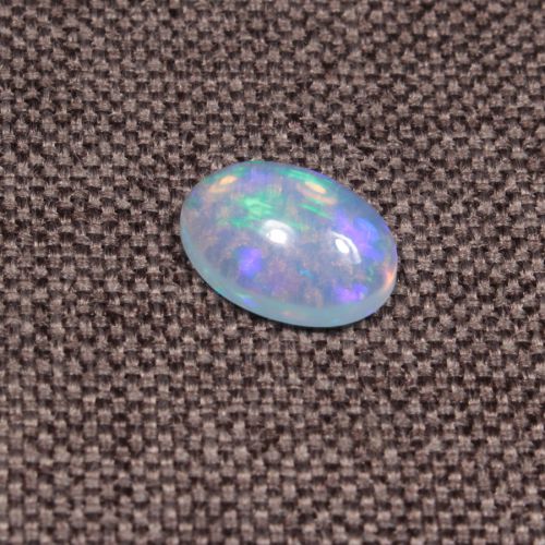 Opal z Etiopii kaboszon ok. 11x8 mm OPA1533