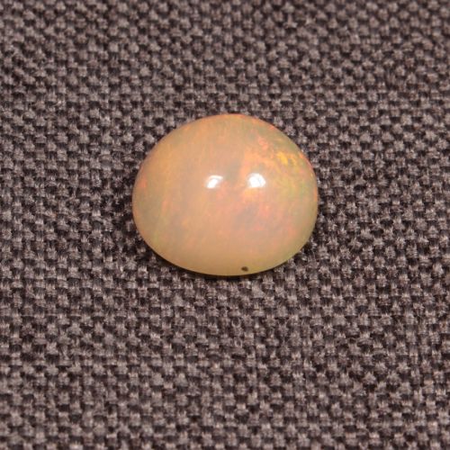 Opal z Etiopii kaboszon ok. 11x10 mm OPA1550