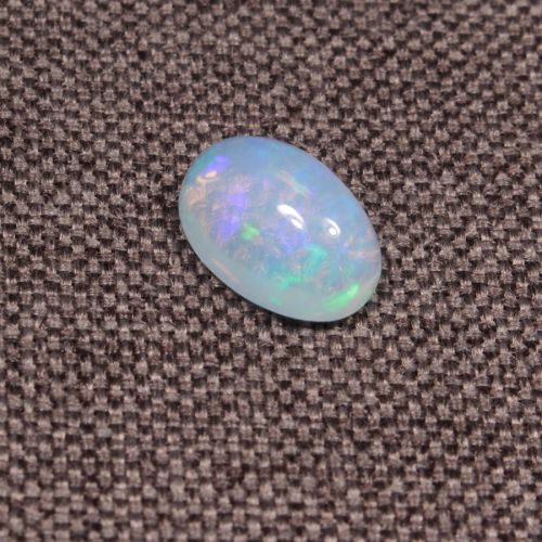 Opal z Etiopii kaboszon ok. 11x8 mm OPA1555