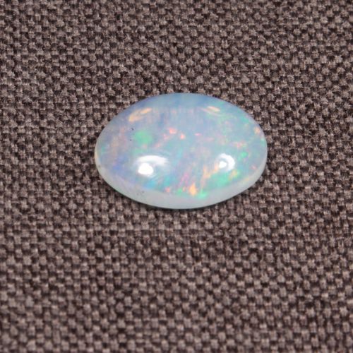 Opal z Etiopii kaboszon ok. 15x11 mm OPA1563