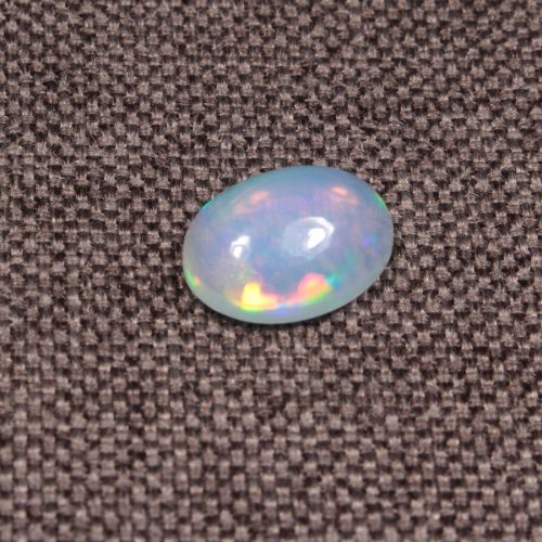 Opal z Etiopii kaboszon ok. 11x8 mm OPA1567