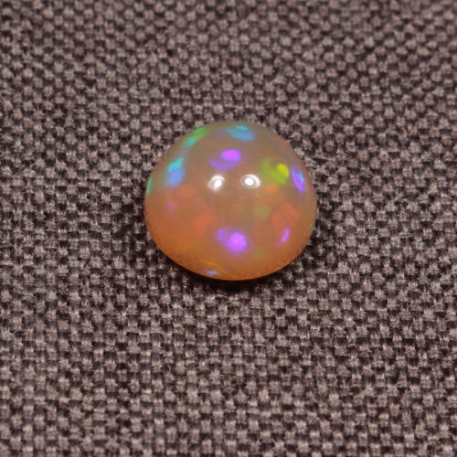 Opal z Etiopii kaboszon ok. 10x11 mm OPA1576