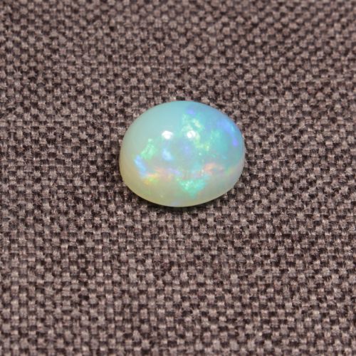 Opal z Etiopii kaboszon ok. 10x8 mm OPA1589