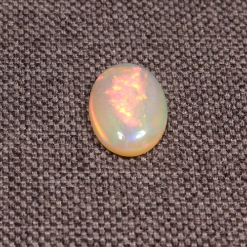 Opal z Etiopii kaboszon ok. 14x9 mm OPA1602