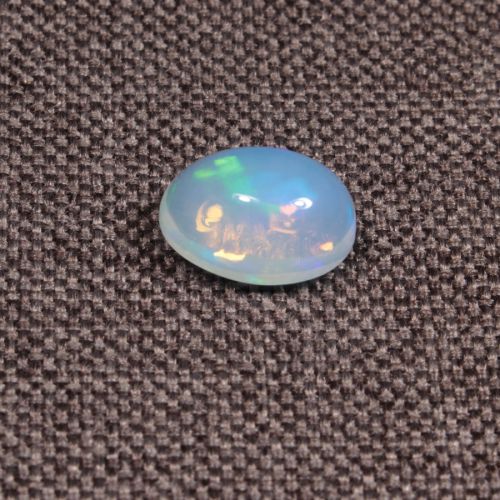 Opal z Etiopii kaboszon ok. 11x8 mm OPA1607