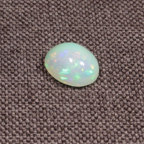 Opal z Etiopii kaboszon ok. 12x9 mm OPA1609