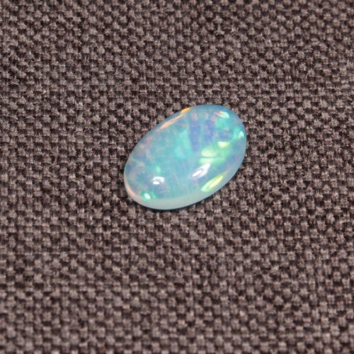 Opal z Etiopii kaboszon ok. 12x8 mm OPA1627