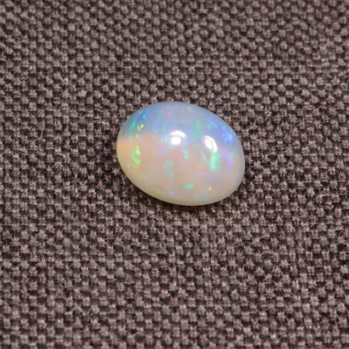 Opal z Etiopii kaboszon ok. 11x8 mm OPA1657