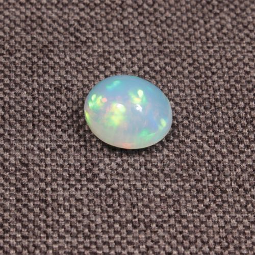 Opal z Etiopii kaboszon ok. 10x9 mm OPA1660