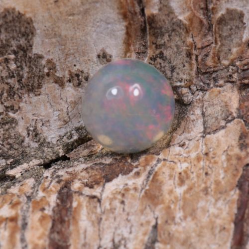 Opal z Etiopii kaboszon ok. 5,27 mm OPA0291