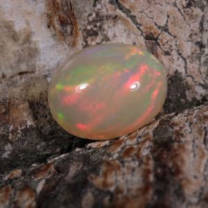 Opal z Etiopii owal kaboszon 9,15 x 7,17 mm OPA0676