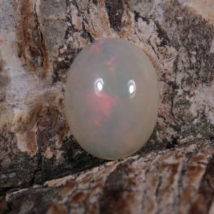 Opal z Etiopii owal kaboszon 9,13 x 7,07 mm OPA0686