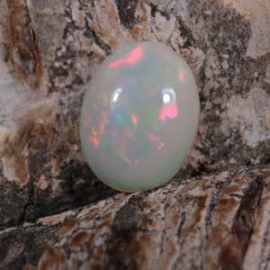 Opal z Etiopii owal kaboszon 8,89 x 6,95 mm OPA0692