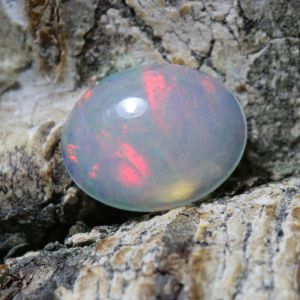 Opal z Etiopii owal kaboszon 8,9x7,1 mm OPA0353
